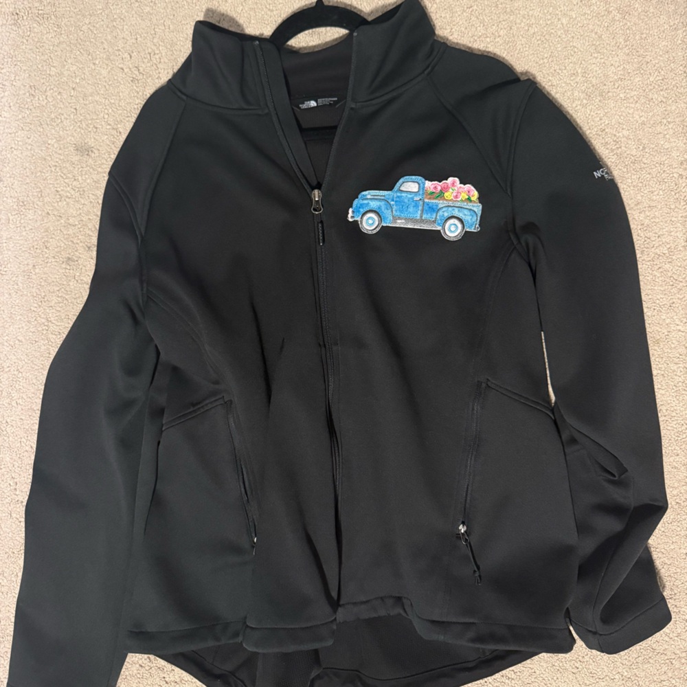 Black Jacket with Blue Car Patch